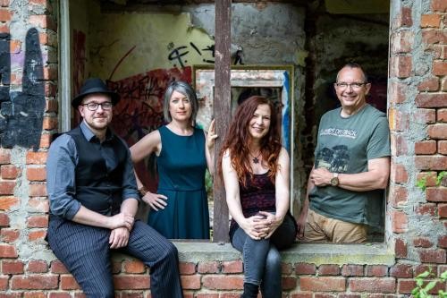 Vier Bandmitglieder Vier Bandmitglieder